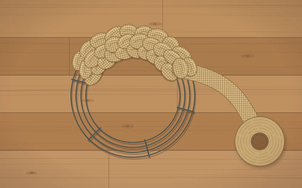 A wire wreath frame with burlap ribbon pushed through in puffy loops along one third of the ring
