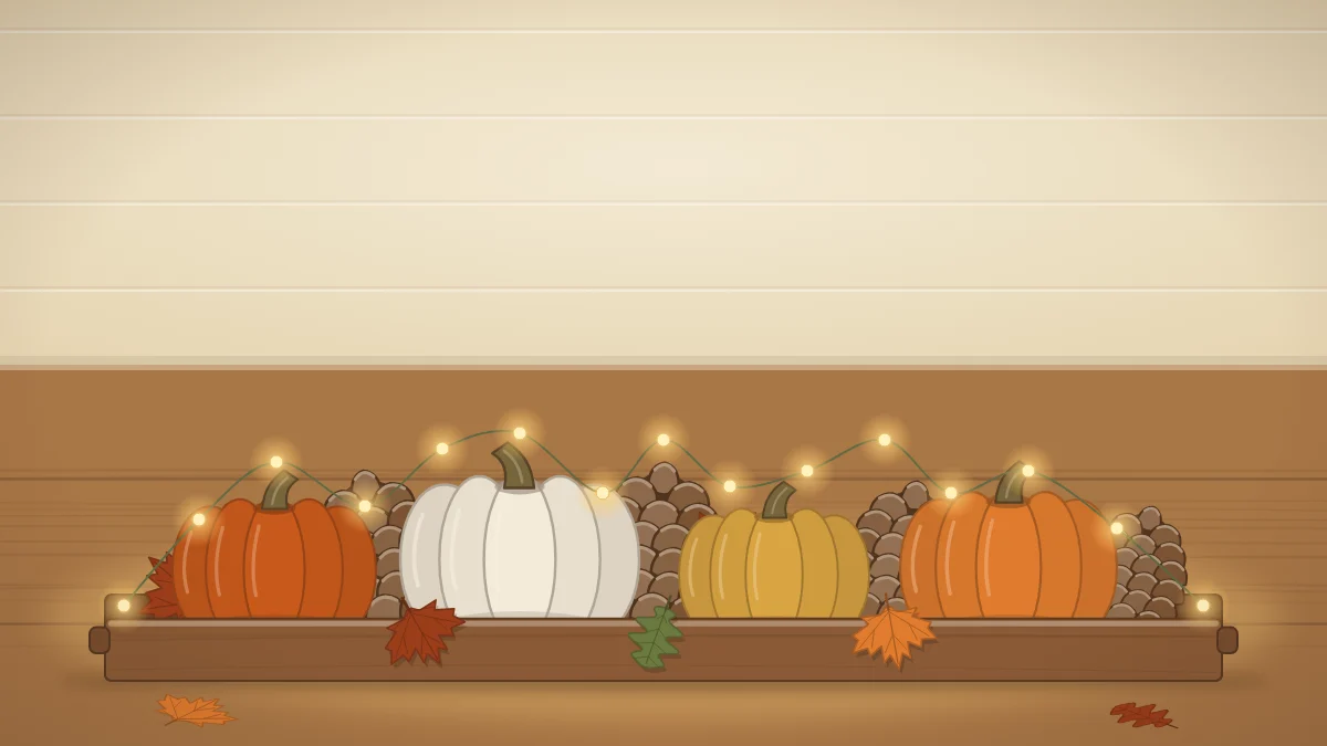 A low wooden tray on a table holding mini pumpkins, pinecones, leaves and a string of small warm battery lights