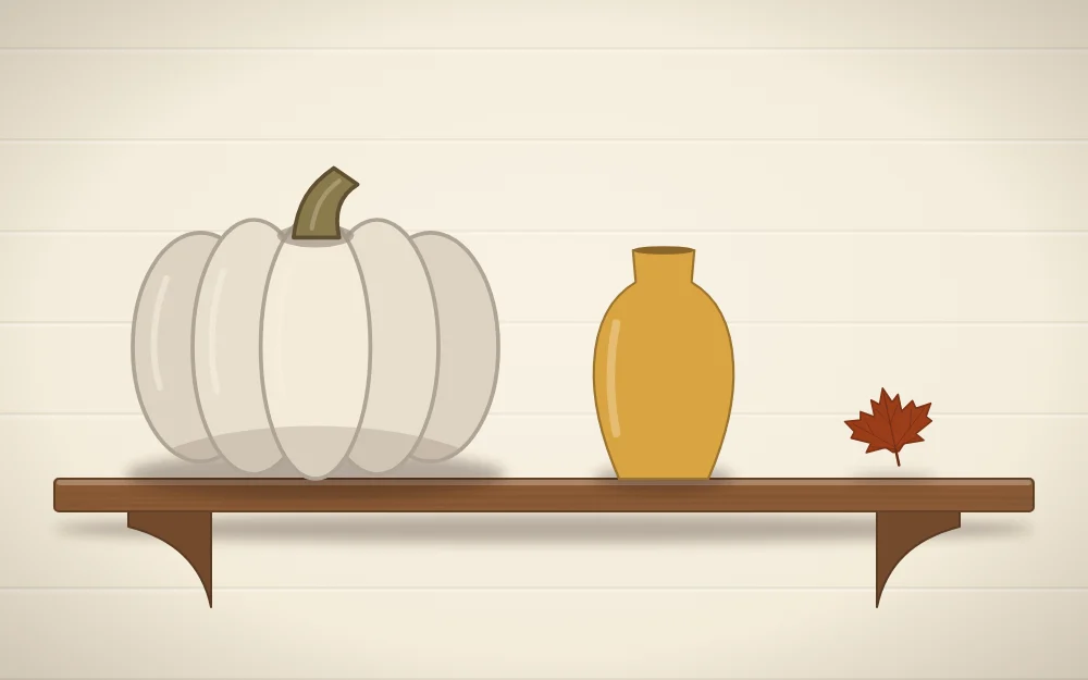A shelf with a large cream pumpkin, a medium mustard vase and one small rust-colored leaf