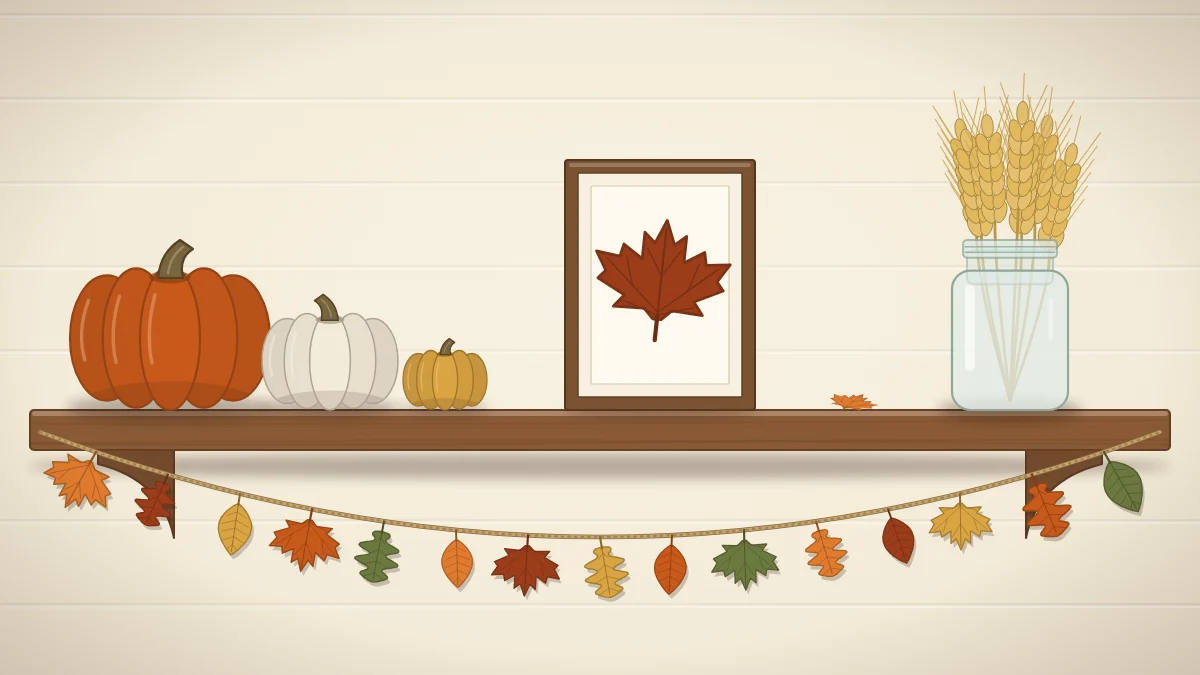 A shelf styled for fall with a leaf garland along the front, pumpkins in three sizes at one end, a jar of wheat at the other and a framed leaf print in the center