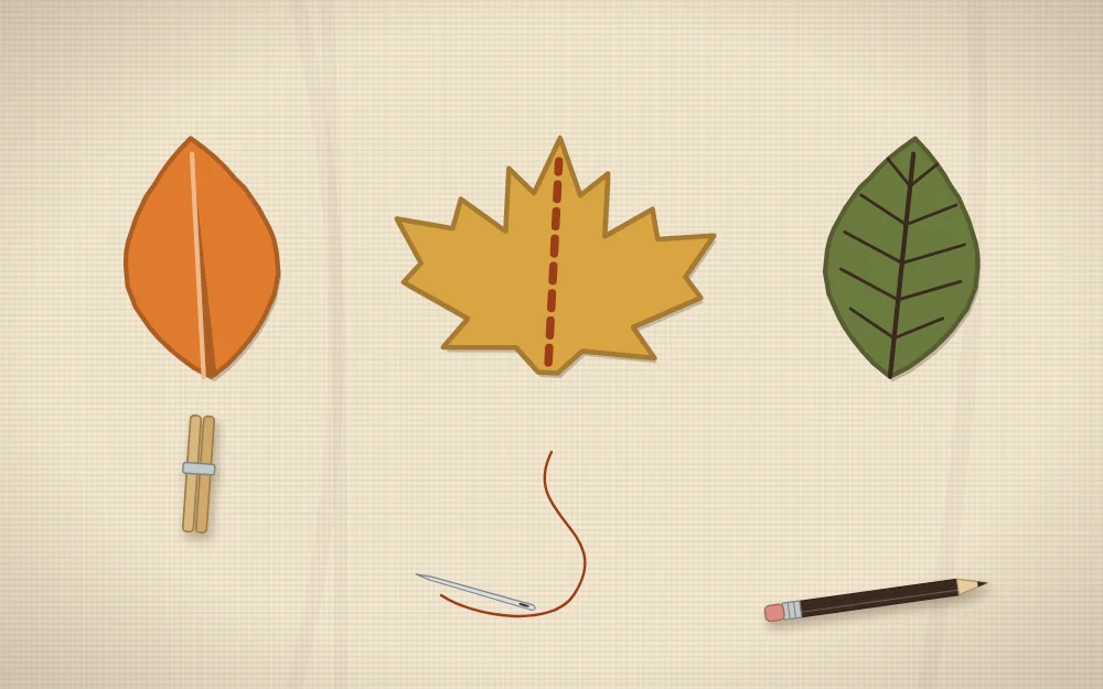 Three felt leaves: one pinched along the center, one with a stitched line and one with drawn veins